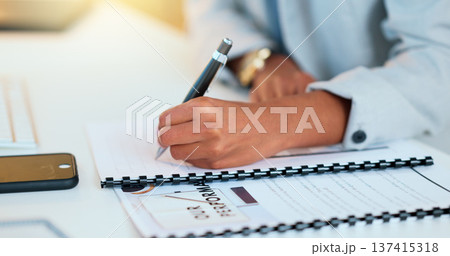 Closeup man hands filling in company paperwork. Professional individual finalizing business documents, step by step approach. Completing contract forms for new employees at the office. 137415318