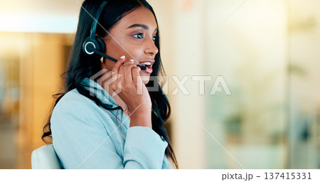 Professional and helpful call centre woman using a headset, assists business consult. Helpful support service agent talks with client on call. Remote worker gives client advice telephonically 137415331
