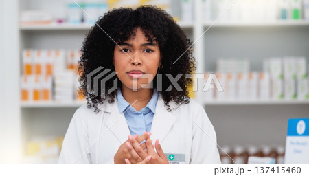 Friendly female chemist explaining the benefits of medicine. African American woman pharmacist listening to the symptoms of the customer. Health worker recommending a specific product to the client Friendly female chemist explaining the benefits of medicine. African American woman pharmacist listening to the symptoms of the customer. Health worker recommending a specific product to the client 137415460