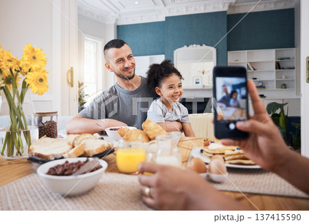 Cellphone, lunch and picture of father, child or happy family for memory photo, bonding and care in brunch dining room. Phone, home photography or kid pose with dad, papa or man for social media post 137415590