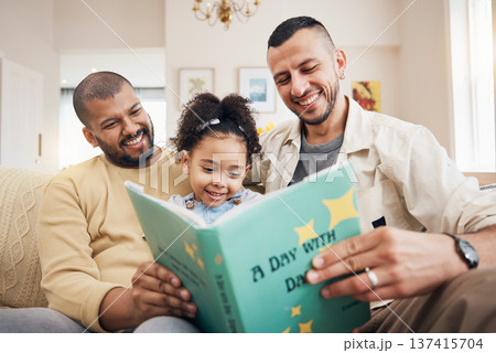 Gay couple, kid and book on couch with smile, bonding and love in storytelling in living room together. Happiness, lgbt men and girl reading story on sofa for fantasy, learning and education in home. Gay couple, kid and book on couch with smile, bonding and love in storytelling in living room together. Happiness, lgbt men and girl reading story on sofa for fantasy, learning and education in home. 137415704