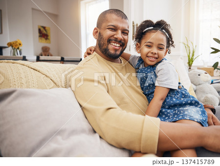 Smile, portrait and girl with her father on a sofa in the living room relaxing and bonding together. Happy, love and child sitting with her young dad from Mexico in lounge of their modern family home 137415789