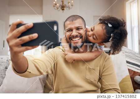 Father, girl and selfie kiss in home living room, bonding and having fun together. Dad, child and hug in profile picture, happy memory and smile on social media post of family on sofa, love and care Father, girl and selfie kiss in home living room, bonding and having fun together. Dad, child and hug in profile picture, happy memory and smile on social media post of family on sofa, love and care 137415802