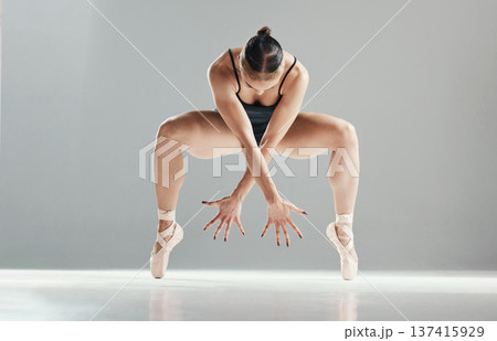 Ballet, performance and woman on a studio background for dance, contemporary art or creativity. Fitness, training and a girl, dancer or ballerina with a move for cardio or rehearsal on a backdrop Ballet, performance and woman on a studio background for dance, contemporary art or creativity. Fitness, training and a girl, dancer or ballerina with a move for cardio or rehearsal on a backdrop 137415929