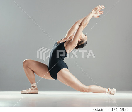 Dancing, ballet and woman in creative performance in studio isolated on gray background mockup space. Ballerina, theatre and person training, workout or exercise in fitness, healthy body or wellness Dancing, ballet and woman in creative performance in studio isolated on gray background mockup space. Ballerina, theatre and person training, workout or exercise in fitness, healthy body or wellness 137415930