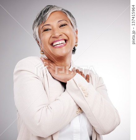 Self love, hug and portrait of a woman on a studio background for happiness or confidence. Smile, mature and a lady or person with care, affection or embrace of body with pride on a backdrop 137415964