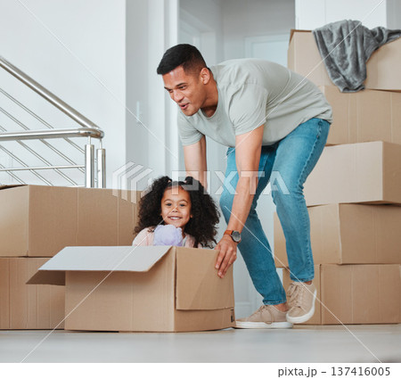 Father, playing and girl in box on floor in living room for celebration, freedom and happiness of new home. Happy, dad and child excited and having fun with property, investment and real estate Father, playing and girl in box on floor in living room for celebration, freedom and happiness of new home. Happy, dad and child excited and having fun with property, investment and real estate 137416005