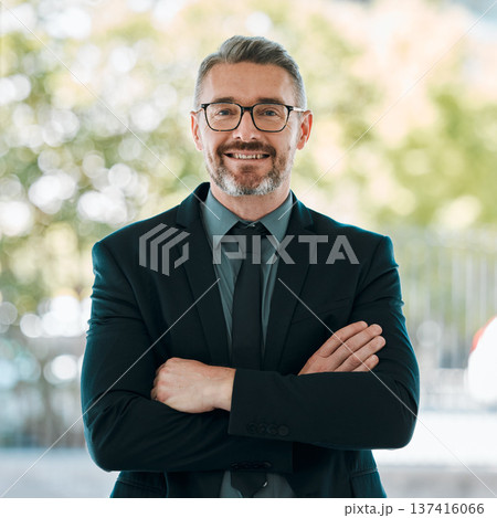 Portrait, smile and arms crossed with a business man outdoor in the city for corporate management or work. Leadership, happy and confidence with a mature manager or professional boss in an urban town Portrait, smile and arms crossed with a business man outdoor in the city for corporate management or work. Leadership, happy and confidence with a mature manager or professional boss in an urban town 137416066