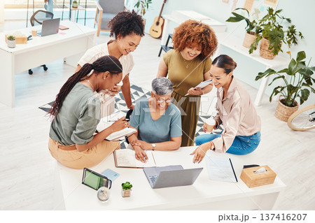 Business women, meeting and computer planning, design teamwork or brainstorming for office website ideas. Group of women in collaboration and notebook or writing goals for branding with laptop above Business women, meeting and computer planning, design teamwork or brainstorming for office website ideas. Group of women in collaboration and notebook or writing goals for branding with laptop above 137416207