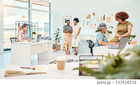 Small business, designer team and women working together for collaboration in fashion industry. Group of people in a modern office for creativity, mission and productivity at a startup company 137416516