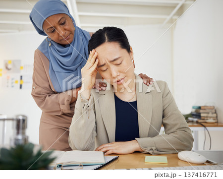 Stress, depression and a business woman with empathy, support and help in office. Burnout, fired and entrepreneur person with headache, bad news or fatigue with hand of muslim friend on shoulder Stress, depression and a business woman with empathy, support and help in office. Burnout, fired and entrepreneur person with headache, bad news or fatigue with hand of muslim friend on shoulder 137416771