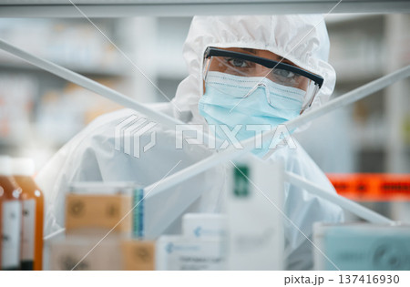 Lab portrait, PPE and face of person for safety security, cleaning hospital clinic or contamination protection. Product shelf investigation, hazmat suit or healthcare worker for emergency danger risk Lab portrait, PPE and face of person for safety security, cleaning hospital clinic or contamination protection. Product shelf investigation, hazmat suit or healthcare worker for emergency danger risk 137416930