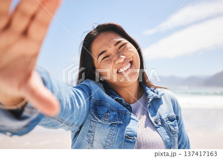 Happy, selfie and woman on beach for holiday, vacation or summer in Indonesia or profile picture for social media or memory. Portrait, smile and person at the ocean, sea or relax in nature for break Happy, selfie and woman on beach for holiday, vacation or summer in Indonesia or profile picture for social media or memory. Portrait, smile and person at the ocean, sea or relax in nature for break 137417163