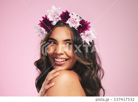 Happy woman, flowers and thinking with crown in studio for natural beauty, skincare and plants on pink background. Face, model and floral wreath for sustainability, eco dermatology and hair cosmetics 137417532