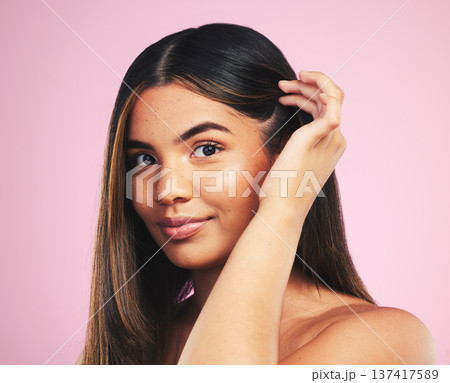 Portrait, hair care and woman with growth, smile and texture on a pink studio background. Face, person or model with skincare, cosmetics and dermatology with self care, salon treatment and luxury Portrait, hair care and woman with growth, smile and texture on a pink studio background. Face, person or model with skincare, cosmetics and dermatology with self care, salon treatment and luxury 137417589