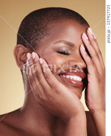 Black woman, hands on face and beauty with manicure, natural cosmetics isolated on studio background. African model, eyes closed and nail care with smile, makeup and dermatology with skincare glow 137417725