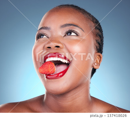 Skincare, strawberry and black woman with beauty, health and wellness on a blue studio background. Person, fruit and model with cosmetics, diet and nutrition with grooming, aesthetic and dermatology Skincare, strawberry and black woman with beauty, health and wellness on a blue studio background. Person, fruit and model with cosmetics, diet and nutrition with grooming, aesthetic and dermatology 137418026