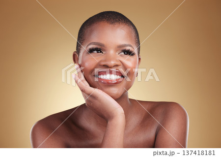Beauty, thinking and a black woman in studio for skin care, glow and cosmetics. Face of a happy african model person with facial makeup shine, dermatology and wellness idea on a beige background Beauty, thinking and a black woman in studio for skin care, glow and cosmetics. Face of a happy african model person with facial makeup shine, dermatology and wellness idea on a beige background 137418181