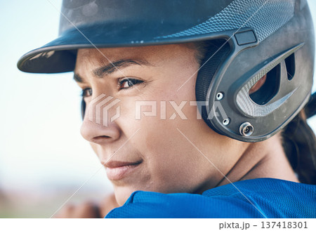 Baseball, face and a person with a helmet outdoor on pitch for sports performance or competition. Professional athlete or softball woman with commitment and fitness for game, training or exercise Baseball, face and a person with a helmet outdoor on pitch for sports performance or competition. Professional athlete or softball woman with commitment and fitness for game, training or exercise 137418301