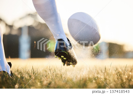 Rugby ball, feet kick and sport game with support, exercise and competition with athlete training. Field and target practice on grass with cardio, fitness and workout with shoe and boot closeup Rugby ball, feet kick and sport game with support, exercise and competition with athlete training. Field and target practice on grass with cardio, fitness and workout with shoe and boot closeup 137418543