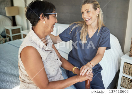 Happy woman, nurse and elderly care in support, healthcare or retirement at old age home. Female person, caregiver or medical professional helping senior patient in consultation or health advice 137418603