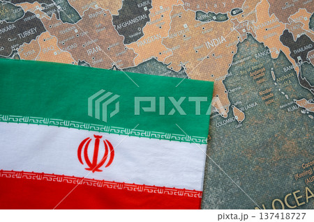 National flag of Iran on the world map background. Iran and USA war. Crisis and terrorism. 137418727