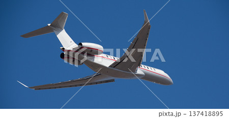 Small business jet, an airplane taking off in the air. Private jet 137418895