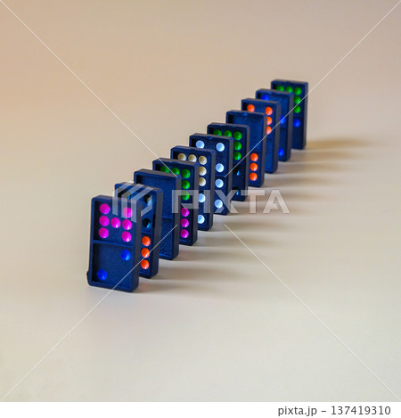 Dominoes game on a color background.Selective focus. 137419310