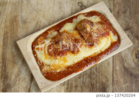 creamy polenta with sausage ragu 137420204