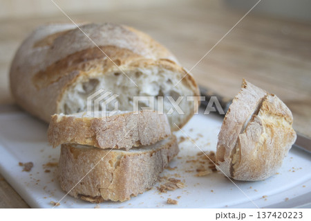 sliced artisan bread on board sliced artisan bread on board 137420223