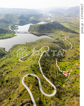 Sabor Valley. Green Hills and Winding Road. Portugal. Aerial View Sabor Valley. Green Hills and Winding Road. Portugal. Aerial View 137420627