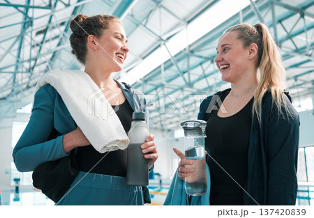 Happy woman, friends and swimming discussion in sports fitness, exercise or training together at indoor pool. Female person or professional swimmers talking in happiness for competition or teamwork 137420839