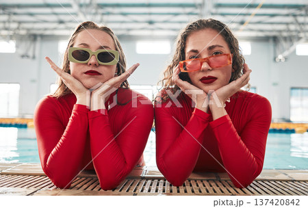 Women, sunglasses portrait and fashion at a pool with gen z, hipster and style of girl friends with clothes. Red swimsuit, cool and trendy urban glasses with young people together in water and gym Women, sunglasses portrait and fashion at a pool with gen z, hipster and style of girl friends with clothes. Red swimsuit, cool and trendy urban glasses with young people together in water and gym 137420842