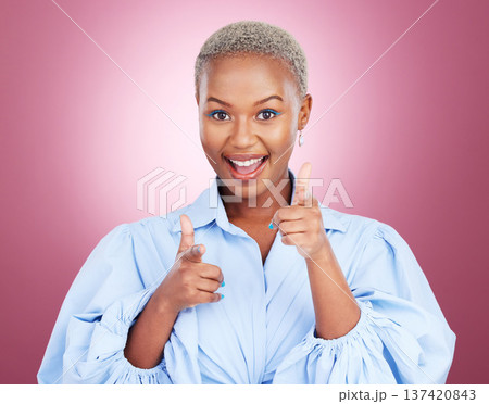 Portrait, pointing and finger guns with a black woman on a pink background in studio for choice or fun. Face, smile or comedy and an excited young model with a hands emoji to vote as a winner Portrait, pointing and finger guns with a black woman on a pink background in studio for choice or fun. Face, smile or comedy and an excited young model with a hands emoji to vote as a winner 137420843