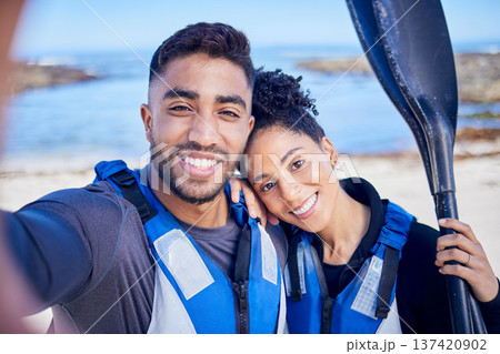 Selfie, kayak and couple with a love, beach and summer vacation with memory, paddle and picture. Portrait, people and man with woman, water sports and social media with ocean, honeymoon and holiday Selfie, kayak and couple with a love, beach and summer vacation with memory, paddle and picture. Portrait, people and man with woman, water sports and social media with ocean, honeymoon and holiday 137420902