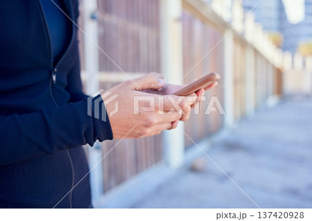 Phone, hands and person outdoor for location, search or internet, maps and travel guide with text in city street. Smartphone, app and online for social media, notification or web chat while waiting 137420928