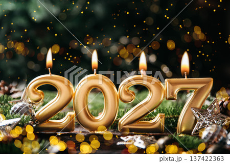 Holiday background Happy New Year 2027. Numbers of year 2027 made by gold burning candles on bokeh festive sparkling background. celebrating New Year holiday, close-up. Space for text 137422363