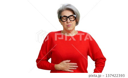 Senior woman suffering from stomach ache and indigestion 137422393