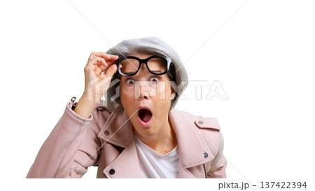 Senior woman reacting with surprise and wide open mouth 137422394