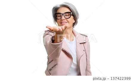 Mature woman showing empty open hand palm Mature woman showing empty open hand palm 137422399