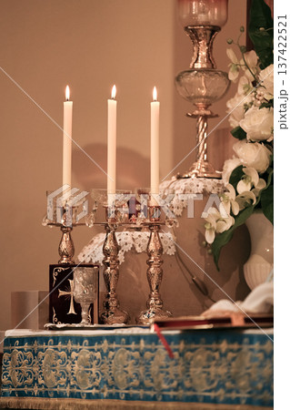 Armenian church altar with candles gospel book silver liturgical decor Armenian church altar with candles gospel book silver liturgical decor 137422521