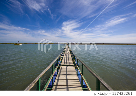 Journey Across Water Toward Distant Horizon Under Sky Journey Across Water Toward Distant Horizon Under Sky 137423261