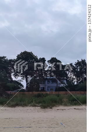 A street in Jurmala in summer. Light summer breeze and coastal town rhythm. 137424312