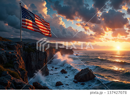 American flag on cliff overlooking ocean at sunset 137427078