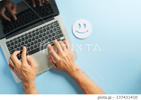Customer review laptop feedback, hands typing keyboard for online satisfaction survey, smiley face icon signifies positive client experience, building good reputation Customer review laptop feedback, hands typing keyboard for online satisfaction survey, smiley face icon signifies positive client experience, building good reputation 137431410