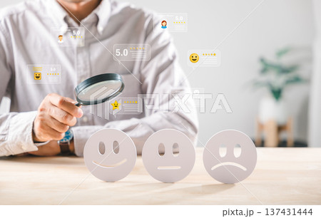 Customer satisfaction, magnifying glass evaluating business quality survey face rating, analyzing happy customer reviews, seeking excellent service experience 137431444