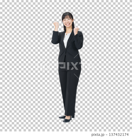A female business person in a suit making a fist pump. A transparent, hand-cut, full-body PNG photo. 137432174