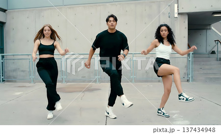 Group of Diverse Young People Performing Street Dance Outdoors on Urban Plaza 137434948