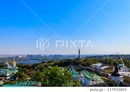 View of Kiev Pechersk Lavra (Kiev Monastery of the Caves), Motherland Monument and the Dnieper river in Ukraine. View from Great Lavra Bell Tower View of Kiev Pechersk Lavra (Kiev Monastery of the Caves), Motherland Monument and the Dnieper river in Ukraine. View from Great Lavra Bell Tower 137435665