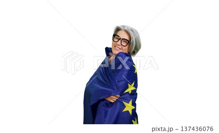 Mature woman embracing European Union flag showing unity 137436076